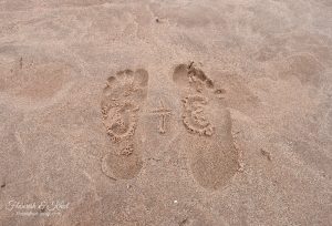 Our footprints in the sand at Cavendish Beach, PEI