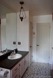 Our master bathroom "BEFORE" - stay tuned for the #OneRoomChallenge makeover! | flourishandknot.com