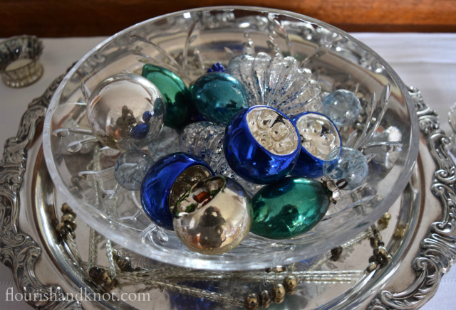 Flourish & Knot's 2015 Christmas Home Tour | flourishandknot.com | Vintage blue, silver, and green glass ornaments in a crystal bowl