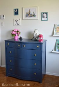 Navy blue dresser with Harry Potter gallery wall and pink accents | flourishandknot.com