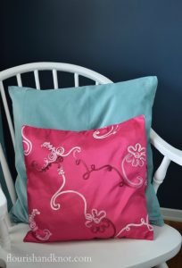 DIY pink and turquoise cushions in our Harry Potter nursery | flourishandknot.com