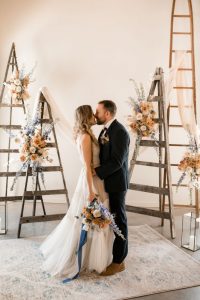 A fine-art wedding shoot at the Verger du Flanc Nord, just outside of Montreal | Terracotta and blue palette with elegant, rustic, boho details