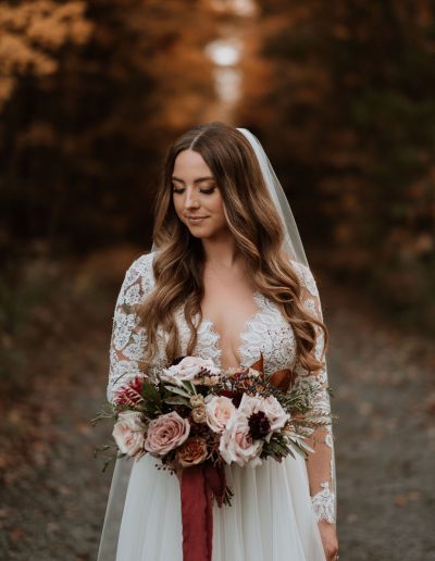 Bride in the fall with blush burgundy and caramel bridal bouquet | Flourish & Knot