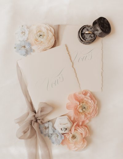 Hand-lettered vow booklets by Neilson Letters with flowers | Kerstin Hahn Photography | Flourish & Knot