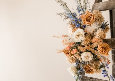 Terracotta blue and cream boho floral arch flowers with dried and fresh flowers | Kerstin Hahn Photography | Flourish & Knot