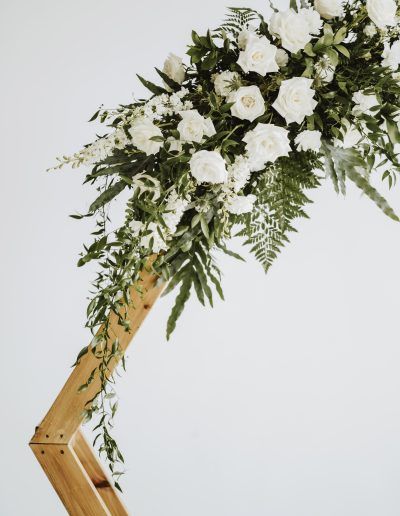 White and green natural wedding arch flowers | Flourish & Knot