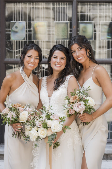 Bride and bridesmaids in champagne dresses with white and blush bouquets | toffee roses bouquets | Flourish & Knot | Montreal wedding florist | Hotel Place D'Armes wedding | Montreal Old Port Wedding