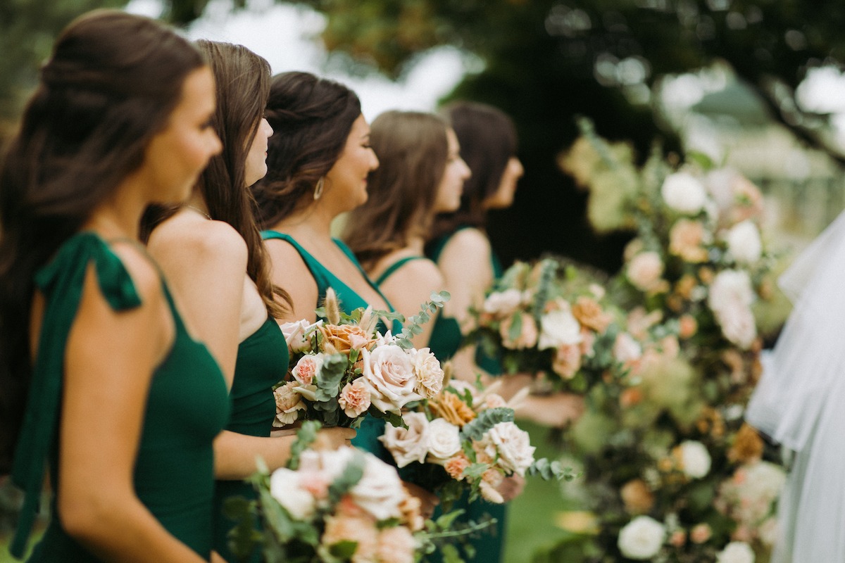 Montreal Old Port Wedding | Elegant and timeless ballroom wedding at the Hotel Place D'Armes in Montreal's historic old port | Flourish & Knot | Montreal wedding florist | Wedding party in champagne with bouquets of roses in a warm neutral palette