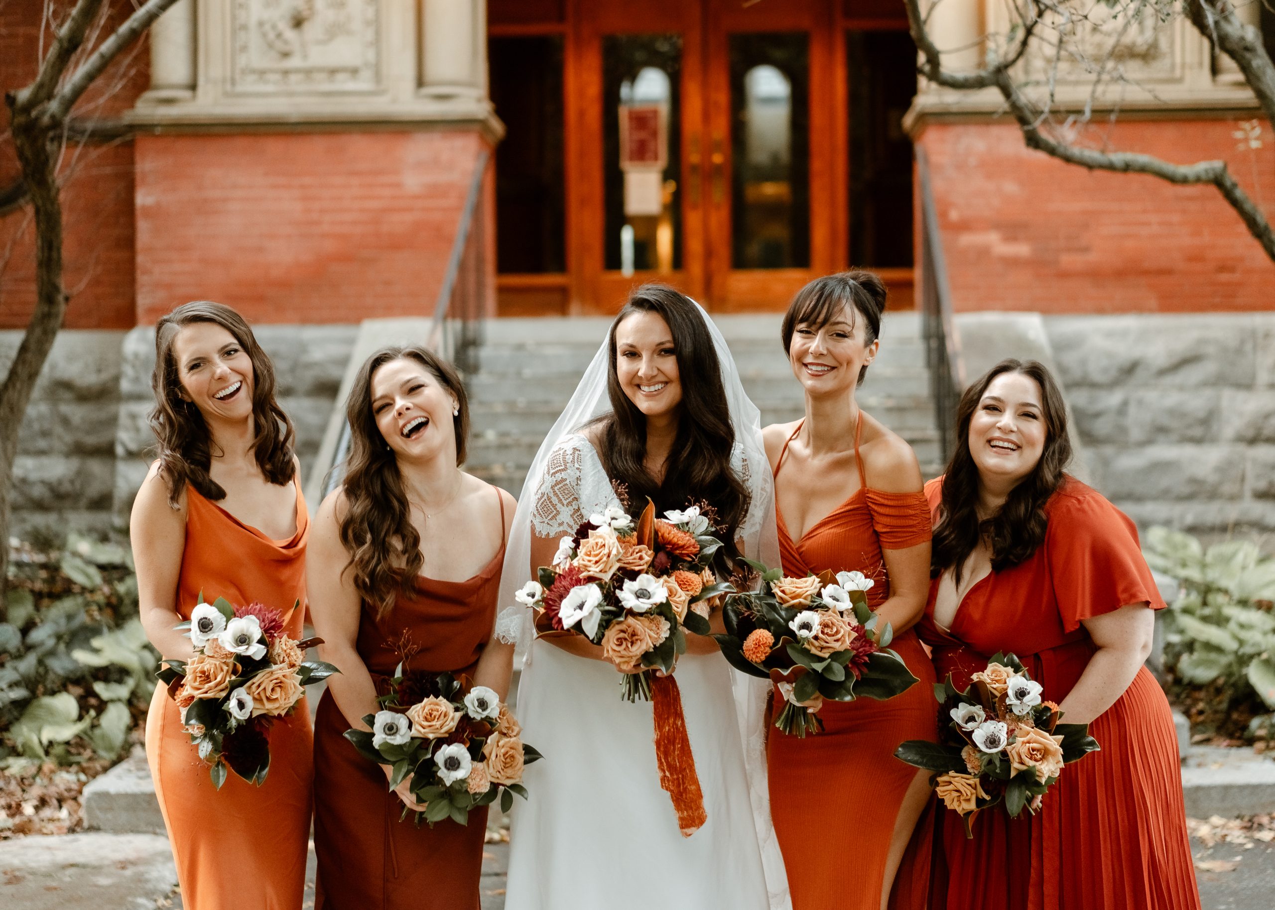 Montreal Old Port Wedding | Elegant and timeless ballroom wedding at the Hotel Place D'Armes in Montreal's historic old port | Flourish & Knot | Montreal wedding florist | Wedding party in champagne with bouquets of roses in a warm neutral palette