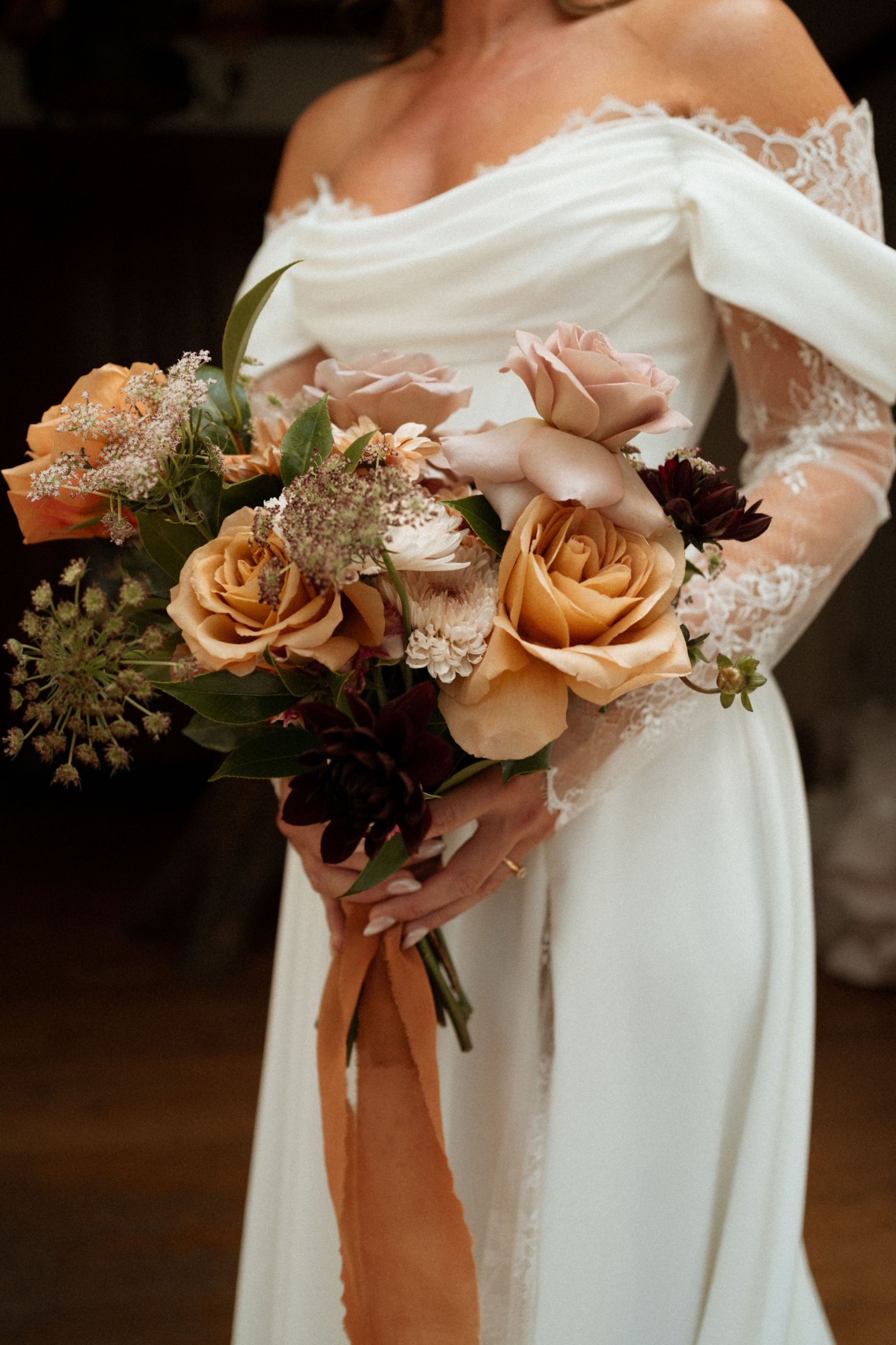 Fine art wedding floral arrangement with movement filled seasonal blooms by luxury Montreal florist Flourish and Knot